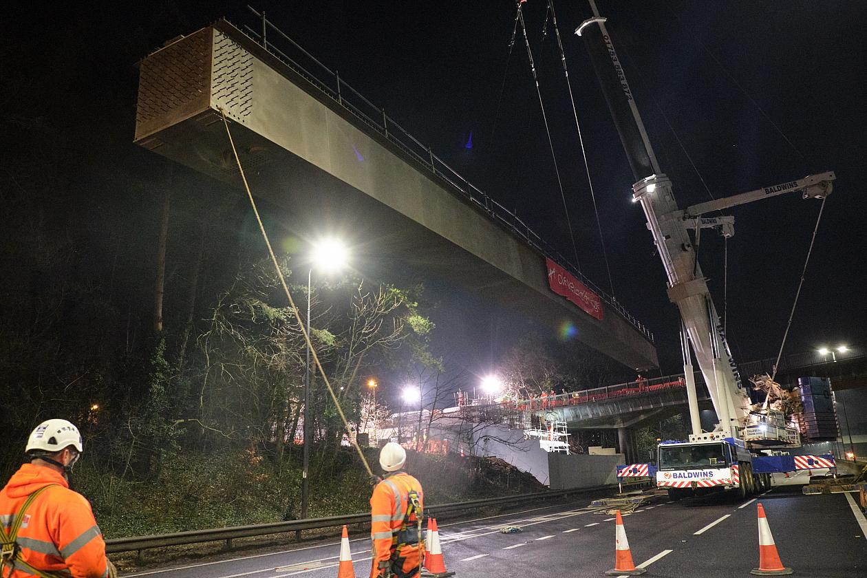 2_First_bridge_girder_being_lifted.jpg